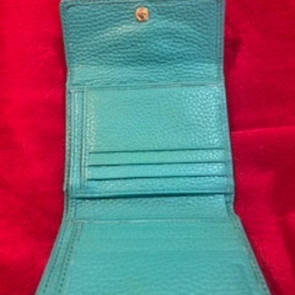 Dooney & Bourke turquoise trifold wallet - Picture 2 of 3